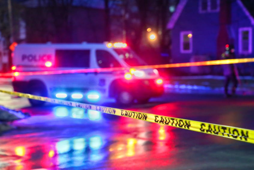 Halifax police block off the scene at the intersection of Connaught and Chisholm avenues early Monday morning after a late-night shooting sent a 32-year-old man to hospital with life-threatening injuries.