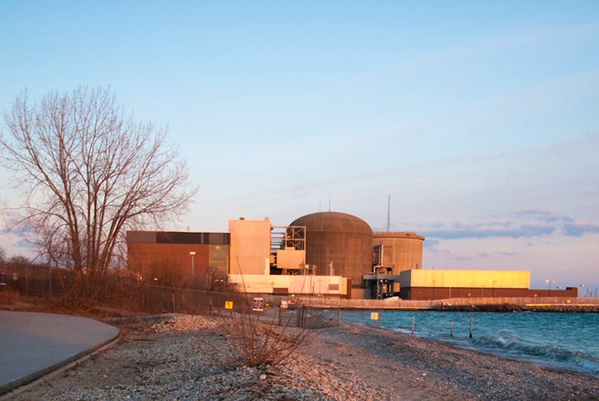 A view of a nuclear power plant in Pickering, Lake Ontario, Canada. - 123RF Stock Photo