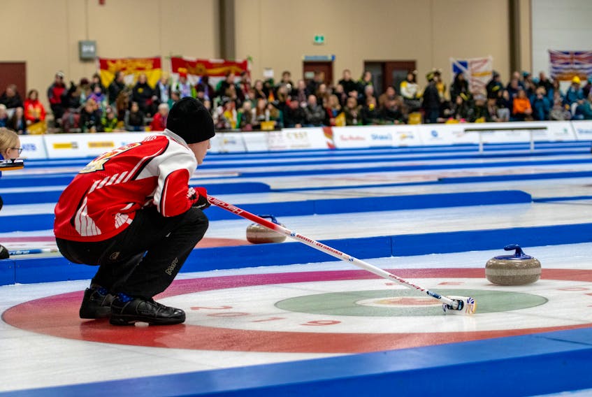 Newfoundland and Labrador skip Nathan Young follows the line on a shot during preliminary-round action in curling at the 2019 Canada Winter Games in Red Deer Alta. — Canada Games photo