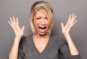 Stock photo of woman losing it. Complaining, freaking out.