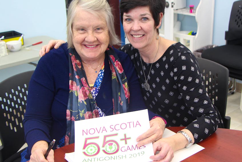2019 Nova Scotia 55+ Games co-chair, veteran town councillor Diane Roberts, and town director of recreation and special events Tricia Cameron hold a copy of the event’s logo which has been recently approved by the provincial board.