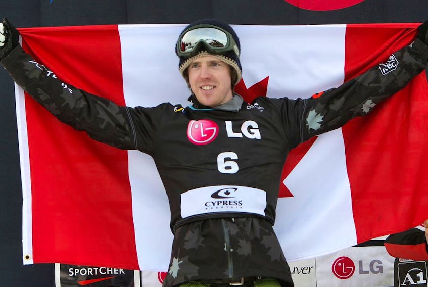 VANCOUVER, CANADA - FEBRUARY 13:  Mike Robertson of Canada celebrates after the finals for the FIS Snowboard-Cross World Cup on February 13, 2009 at Cypress Mountain in West Vancouver, British Columbia, Canada. Robertson finished in second place.