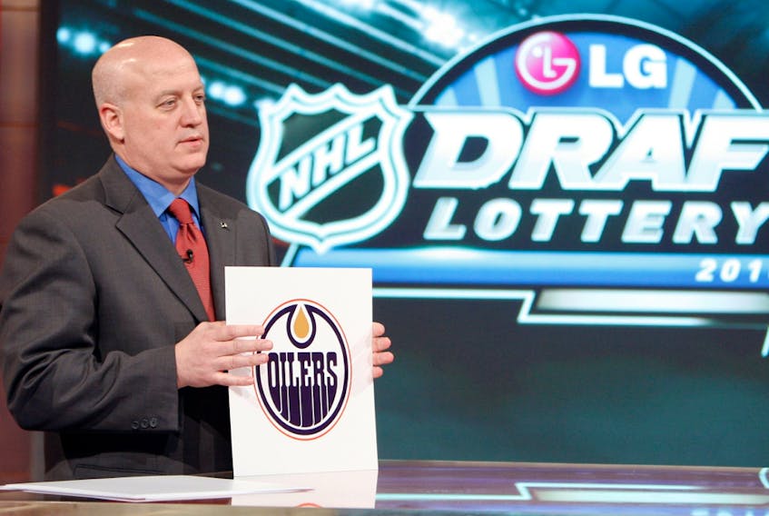 NHL deputy commissioner Bill Daly announces the top pick to the Edmonton Oilers during the NHL Draft Lottery at the TSN Studio on April 13, 2010, in Toronto. (Photo by Abelimages / Getty Images for NHL)