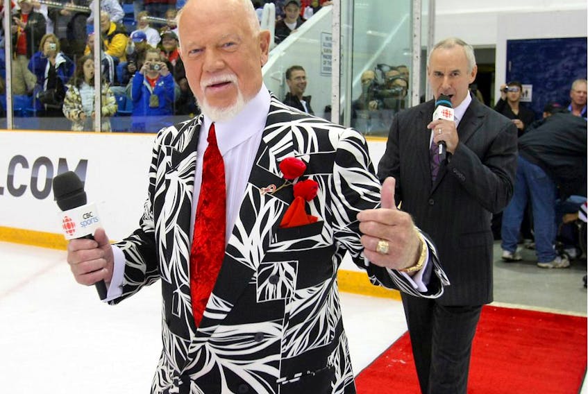  Don Cherry and Ron MacLean of Hockey Night in Canada walk to centre ice as the Buffalo Sabres take on the Ottawa Senators at J.L. Grightmire Arena on Sept. 28, 2010 in Dundas, Ont.