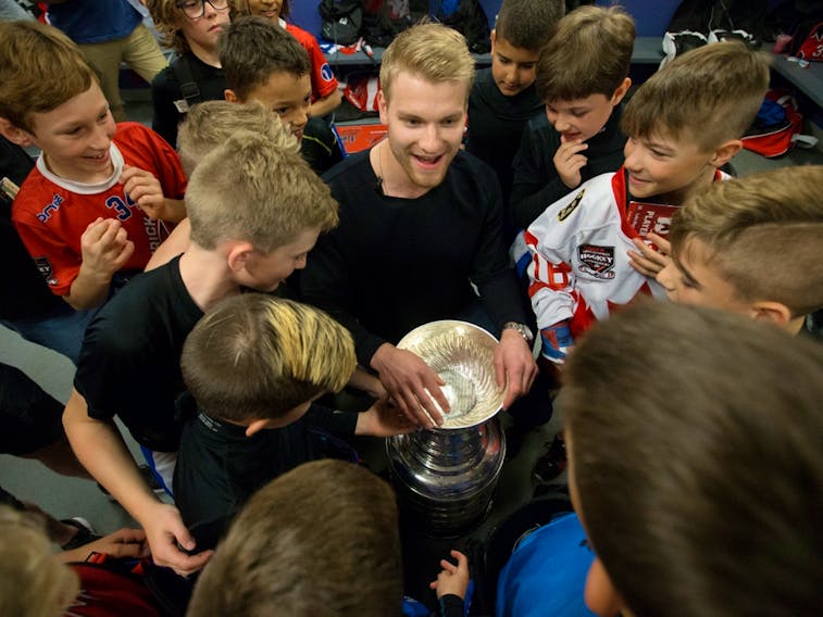St. Louis Blues defenceman Colton Parayko and the Stanley Cup visit Team Brick Alberta players during the Brick Invitational Hockey Tournament at West Edmonton Mall on July 3, 2019.