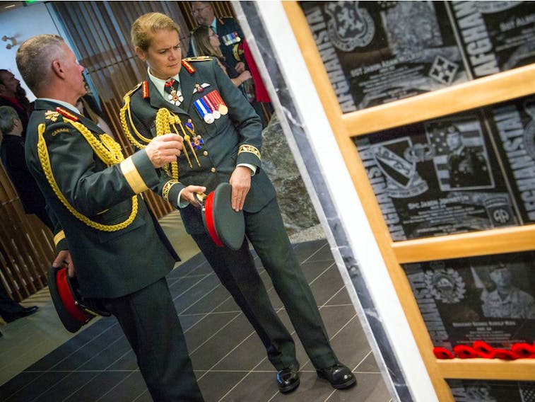 General Jonathan Vance, Chief of Defence Staff, and Governor General Julie Payette take a tour through the Afghanistan Memorial Hall.