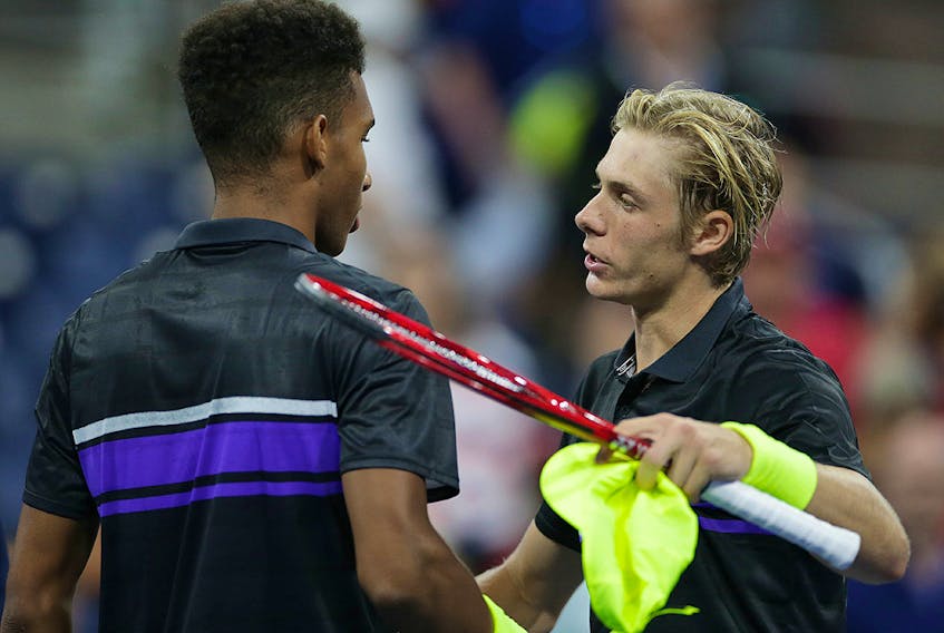 Denis Shapovalov of Canada (right) greets Felix Auger-Aliassime of Canada (left) after a first round match on day two of the 2019 U.S. Open tennis tournament at USTA Billie Jean King National Tennis Center. (Jerry Lai/USA TODAY)