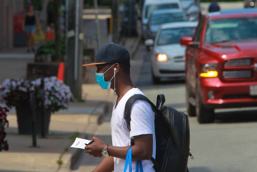 Man seen wearing a mask on Spring Garden Road on July 30, 2020.