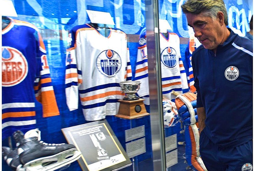 Edmonton Oilers head coach Dave Tippett walks away after speaking to the media during players physicals at the start of training camp at Rogers Place in Edmonton, September 12, 2019. 