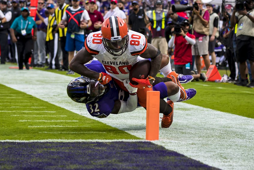Jarvis Landry #80 of the Cleveland Browns dives for the end zone as DeShon Elliott #32 of the Baltimore Ravens defends during the second half at in Baltimore on Sunday. The Brown won the game.  Scott Taetsch/Getty Images