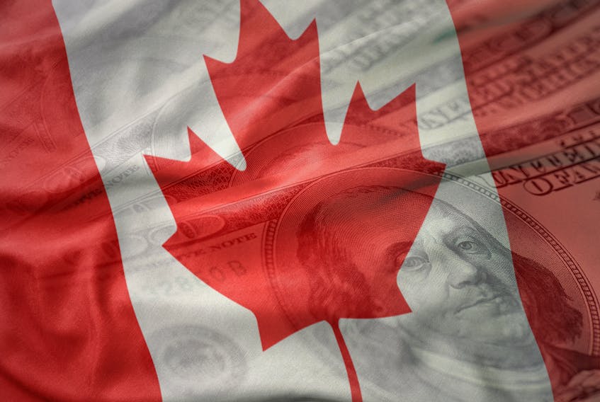 A Canadian flag over United Staes currency-123RF