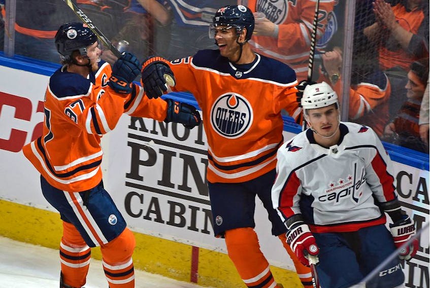 Edmonton Oilers Darnell Nurse (25) celebrates his goal with Connor McDavid (97) playing against the Washington Capitals during NHL action at Rogers Place in Edmonton on Thursday, Oct. 24, 2019.