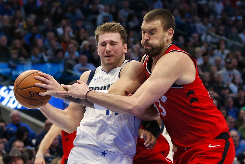 Dallas Mavericks guard Luka Doncic (77) drives against Toronto Raptors center Marc Gasol (33) during the second quarter at American Airlines Center. Tim Heitman-USA TODAY Sports