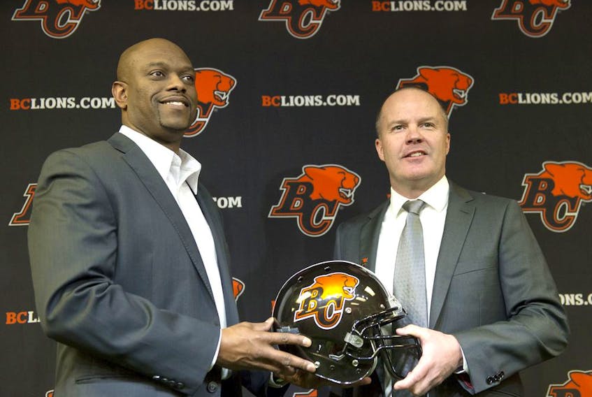 B.C. Lions general manager Ed Hervey (left) announced the hiring of Rick Campbell (right) as the CFL team's new head coach at the team's Surrey training facility on Dec. 2, 2019. [PNG Merlin Archive] ORG XMIT: POS1912021614370827