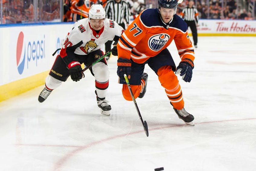  Edmonton Oilers’ Oscar Klefbom (77) battles Ottawa Senators’ Vladislav Namestnikov (90) during the third period of a NHL hockey game at Rogers Place in Edmonton, on Wednesday, Dec. 4, 2019. Ian Kucerak / Postmedia