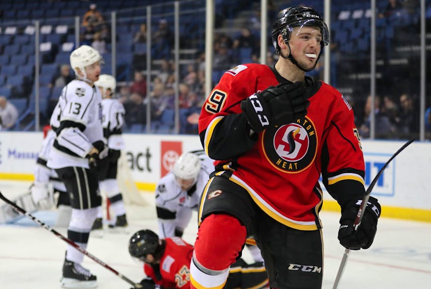 Calgary Flames forward prospect Luke Philp celebrates after scoring for the American Hockey League’s Stockton Heat earlier this season. 