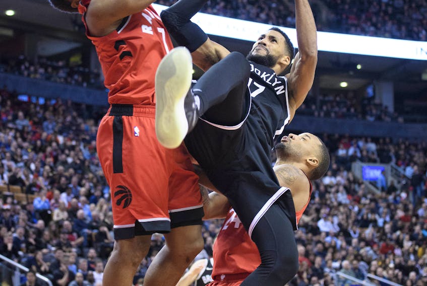 Brooklyn Nets guard Garrett Temple (17) drives to the basket as Toronto Raptors guard Kyle Lowry (7) tries to defend during the fourth quarter at Scotiabank Arena. Nick Turchiaro-USA TODAY Sports