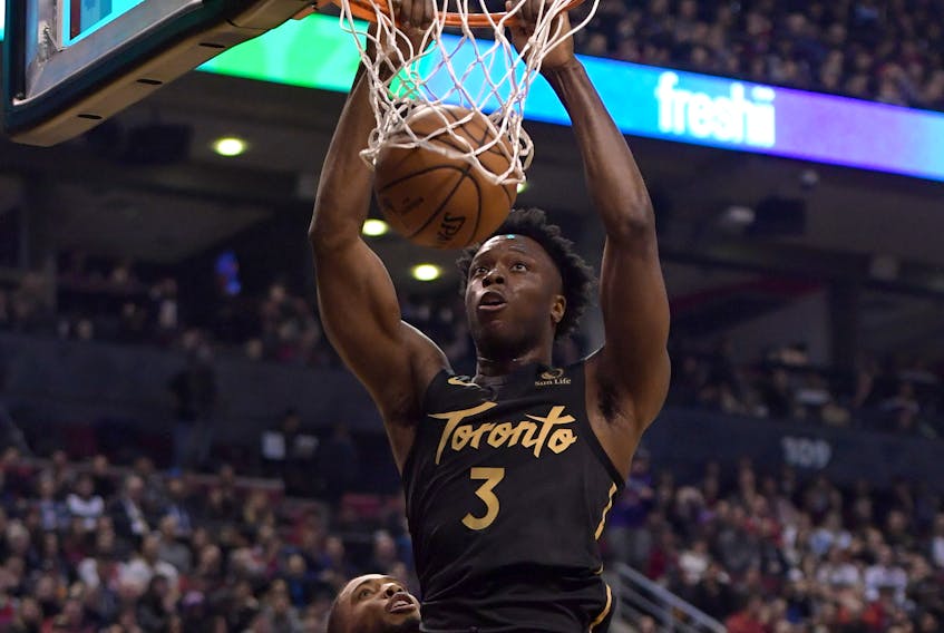 Toronto Raptors forward OG Anunoby (3) dunks against the Phoenix Suns in the first half at Scotiabank Arena. Dan Hamilton-USA TODAY Sports 
