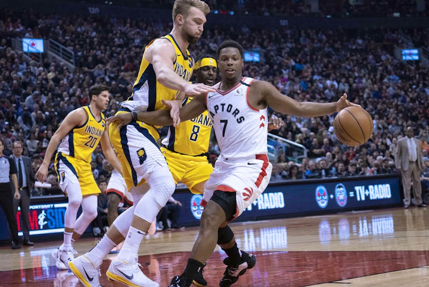  Raptors guard Kyle Lowry (7) controls a ball as Indiana Pacers forward Domantas Sabonis (11) defends during the second quarter at Scotiabank Arena. Nick Turchiaro-USA TODAY Sports 