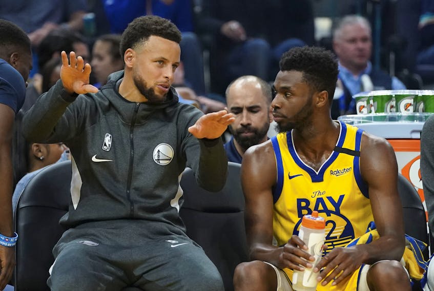 Warriors guard Stephen Curry (left) could be making his return to the lineup against the Raptors on Thursday. Since being traded to Golden State last month, Andrew Wiggins has been putting up big numbers.  Kyle Terada/USA TODAY Sports