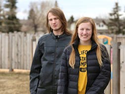 High school graduates, brother and sister, Colin and Samantha Coleman were set to attend graduation but plans have now been cancelled. The pair pose near their home in Calgary on Saturday, April 18, 2020. Jim Wells/Postmedia