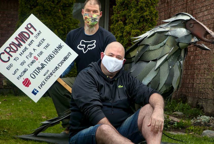  Using two old bathtubs, some car parts and part of a plough, local artist and sculpture David Harries (left) has made a huge sculpture entitled Crowvid-19.  He invited people to bid on having the sculpture displayed at their home for a week to raise money for the local food bank. 