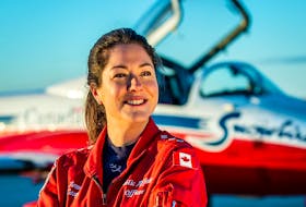 Royal Canadian Air Force Captain Jennifer Casey, who was killed in the crash of a jet from the Snowbirds aerobatics team in Kamloops, British Columbia, poses in an undated photograph.  