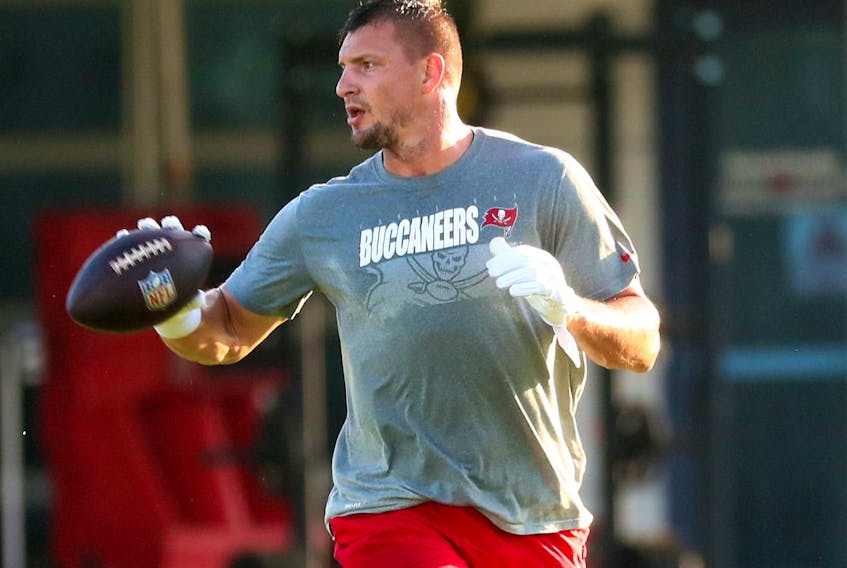 Bay Buccaneers tight end Rob Gronkowski  practises at AdventHealth Training Center. The NFL still is going ahead with its season.