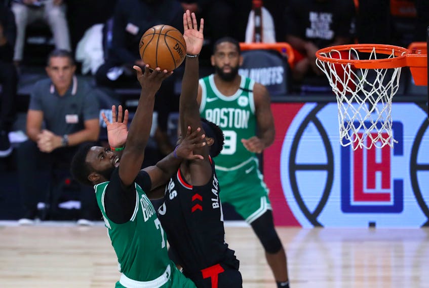 Toronto Raptors forward Pascal Siakam blocks Boston Celtics guard Jaylen Brown during Game 6 of the second round of the playoffs.