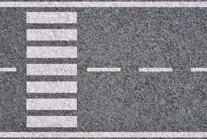 Stock image of a crosswalk.