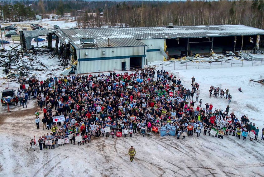 An arial view of the crowd that gathered in the parking lot of the burned down Tyne Valley Community Sports Centre on Saturday morning. - Skygate Videography & Aerial Drone Services - PEI/Facebook photo