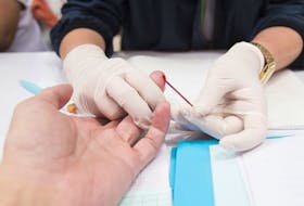 Blood drop for blood testing. Nurses collect blood from blood donor for blood donation. (iStockphoto)