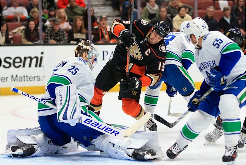 Vancouver Canucks' netminder Jacob Markstrom makes a pad save on Ryan Getzlaf of the Anaheim Ducks during NHL action in Anaheim, Calif.