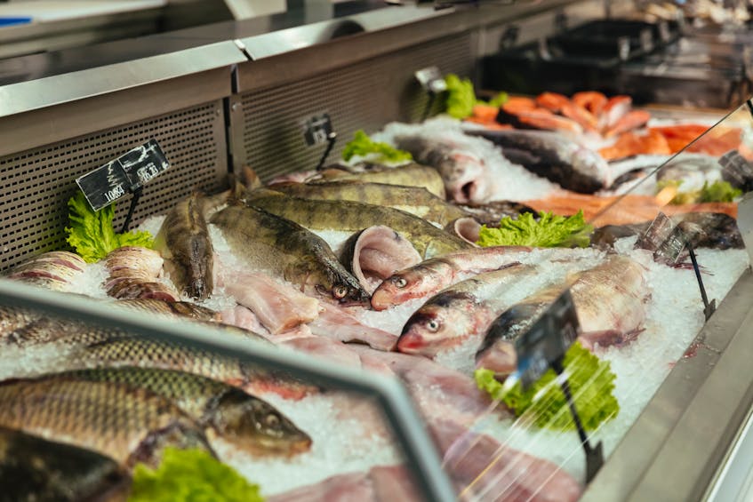 Fish are on display at a grocery store in this stock photo.