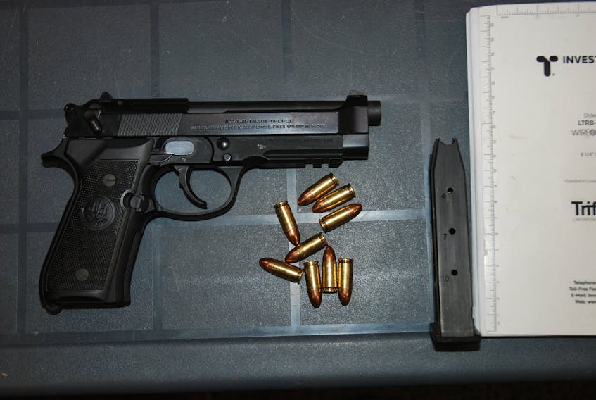 During the search of a Summerside business, police located a loaded 9-mm handgun and a significant quantity of suspected cocaine.