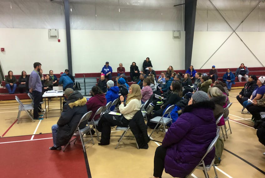 Dr. Gabe Woollam, Labrador-Grenfell Health's vice president of medical services, speaking at a community meeting held in Nain on April 6.