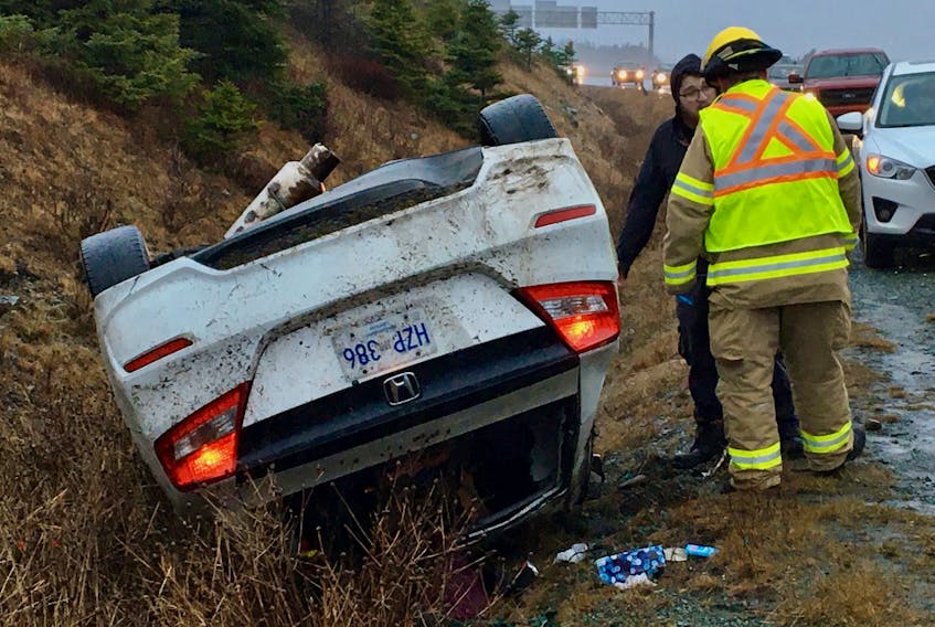 The male driver of a car was not injured after it overturned on the T.C.H. Near Peacekeepers Way Saturday afternoon. Keith Gosse/The Telegram