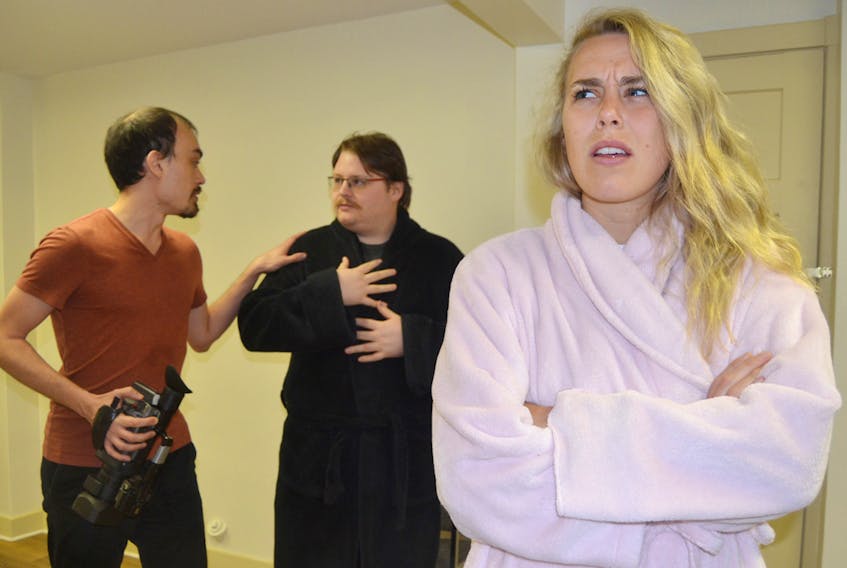 Actors appear in a rehearsal scene from ACT’s production of “Skin Flick” by Norm Foster. From left are Noah Nazim, Alex Arsenault and Jenna Marie. The show opens April 19 at the Watermark Theatre in North Rustico. SALLY COLE/THE GUARDIAN