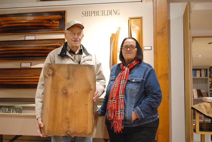 Charles Richardson recently donated a plank of wood from War Halifax to the Queens County Museum in Liverpool.