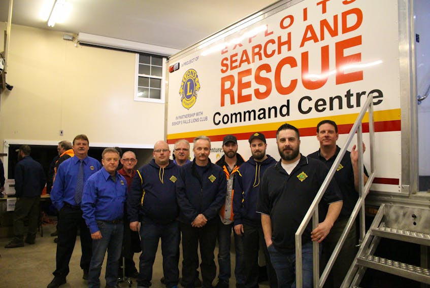Members of the Bishop’s Falls Lions Club and Exploits Search and Rescue team celebrate the unveiling of the crew’s new command centre Feb. 1 at their base in Grand Falls-Windsor.
