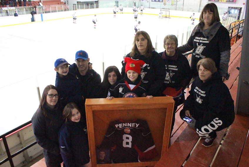 Ethan Penney’s jersey retirement ceremony was moving and emotional, and his family couldn’t have been happier to be part of it. A few of them gathered around his framed jersey at the end of the ceremony, including Ashley Penney, Hailey Penney, Jack Penney, Jerome Penney, Christa Penney, Logan Hibbs, Christanne Hibbs, Monnie Burt, Wanda Pope and Genny Steele.