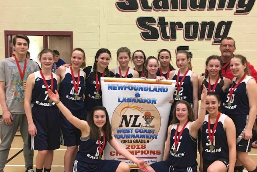Exploits Valley Intermediate’s Grade 8 Eagles won gold at the NL Basketball Association’s West Coast Grade 8 championship hosted in Summerford over the weekend. Front, from left: Alyssa Manuel, Cassondra House and Robyn Anthony; back, from left: coach Brett Power, Eva Griffin, Kennedy Bulgin, Robin Reid, Mackenzie Watton, Faith Power, Erica Power, Heidi Beson, Faith Turpin, Mia Fifield, Alyssa Wiseman and coach Randy Edison. Missing from photo: coach Wendy Power.