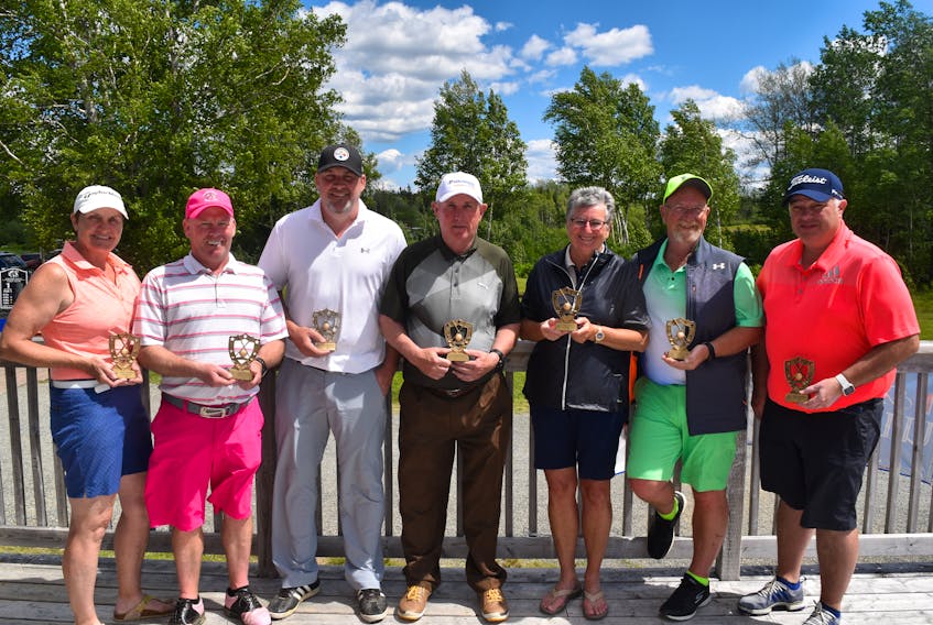 Pictured, from left, are Jackie Howard, 1st Low Net Ladies' Division; Robert Goulding, 1st Low Net Men’s A Division; Mark Kelly, 1st Low Gross Men’s B Division; Randy Reid, 1st Low Gross A Division (Male Champion); Anita Kelly, 1st Low Gross Ladies’ Division (Female Champion); Barry Snow, 1st Low Net Men’s C Division; and Paul Glavine, 1st Low Net Men’s B Division. Missing from photo is Rick Howlett, 1st Low Gross Men’s C Division.