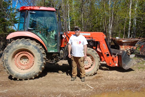 Chris Blackmore of Exploits Acres at his farm on June 5.