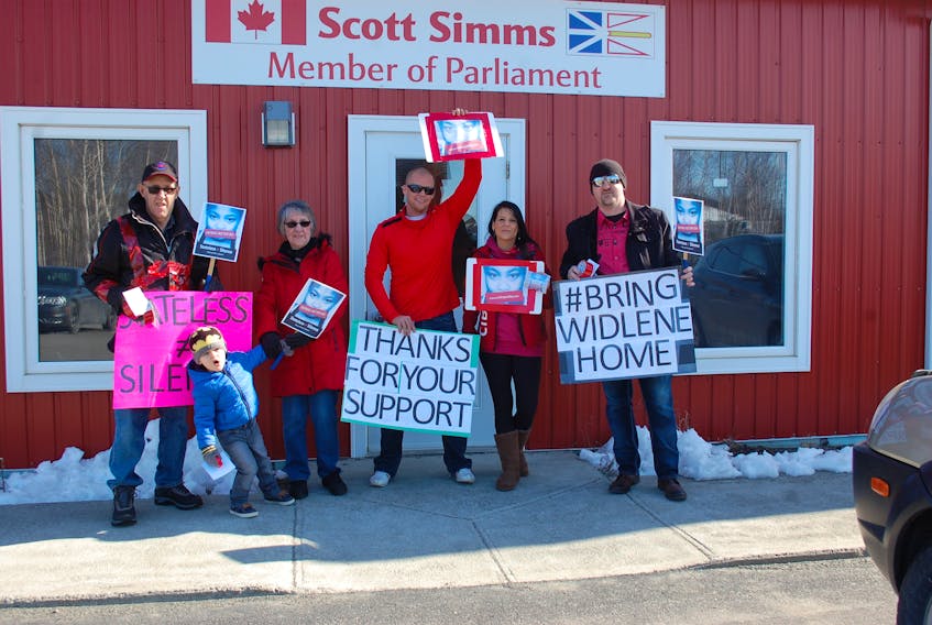 Protestors gather in front of MP Scott Simms’ office in Grand Falls-Windsor in a show of support for Widlene Alexis April 11.