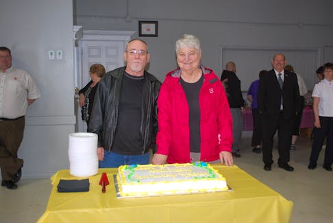 James Neville and Nellie Richards have been attending the Grand Falls-Windsor Community Kitchen from the start. They cut a cake commemorating the third anniversary of the program at St. Joseph’s Hall on Wednesday, June 13.