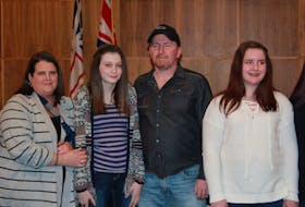 Sabrina Rogers, Brooklyn Rogers, Keith Rogers and Chloe Cuff are credited with helping save the life of John MacSween. The group all received Rescuer Awards from the Canadian Red Cross.