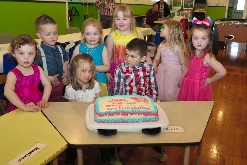 The James Hornell Boys and Girls Club held its preschool graduation May 17.  Nine children enjoyed the classes with their friends since last fall. Pictured are (front) Rachel Kirby, Madison Blundon, Alexander Gushue, Charleigh LeDrew; (back) Ryker Dixon, Skylar Brown, Alyson Caines and Neveah Hobbs receiving their preschool diplomas from teacher Marg Walsh. She also gave each of them a framed photo of the class. Missing from photo is Luke Blundon.