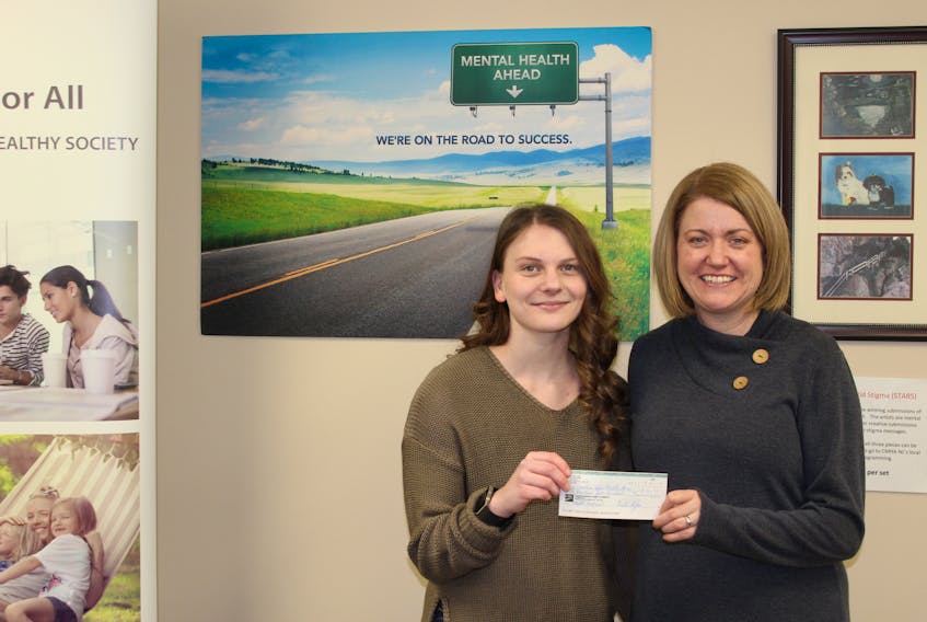 Abigail Peyton of Bishop’s Falls presented a $1,500-cheque to Tia Morris