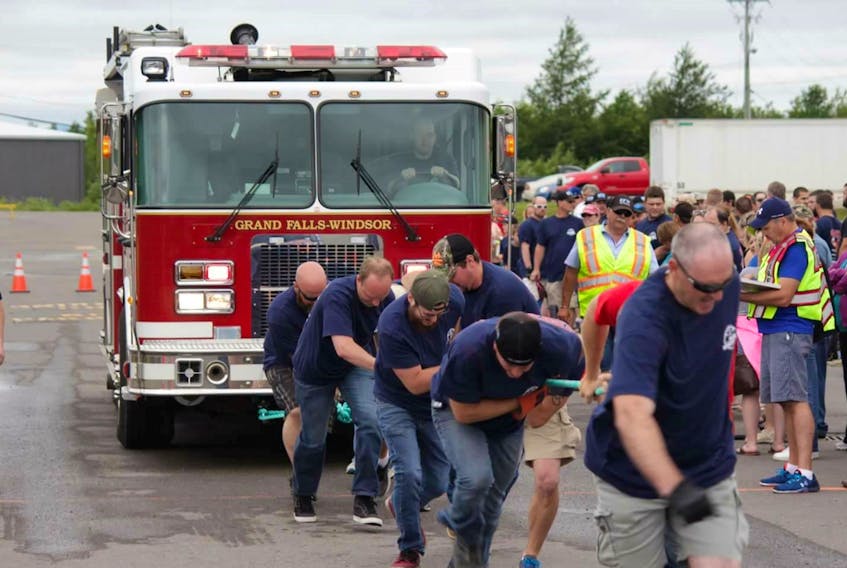 A team hauls a fire truck during a previous pull challenge in Grand Falls-Windsor. This year’s competition will take place on August 4.